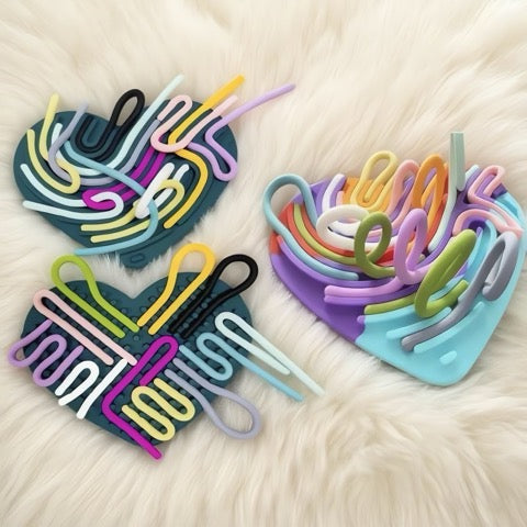 Colorful sensory tool on a soft fabric background