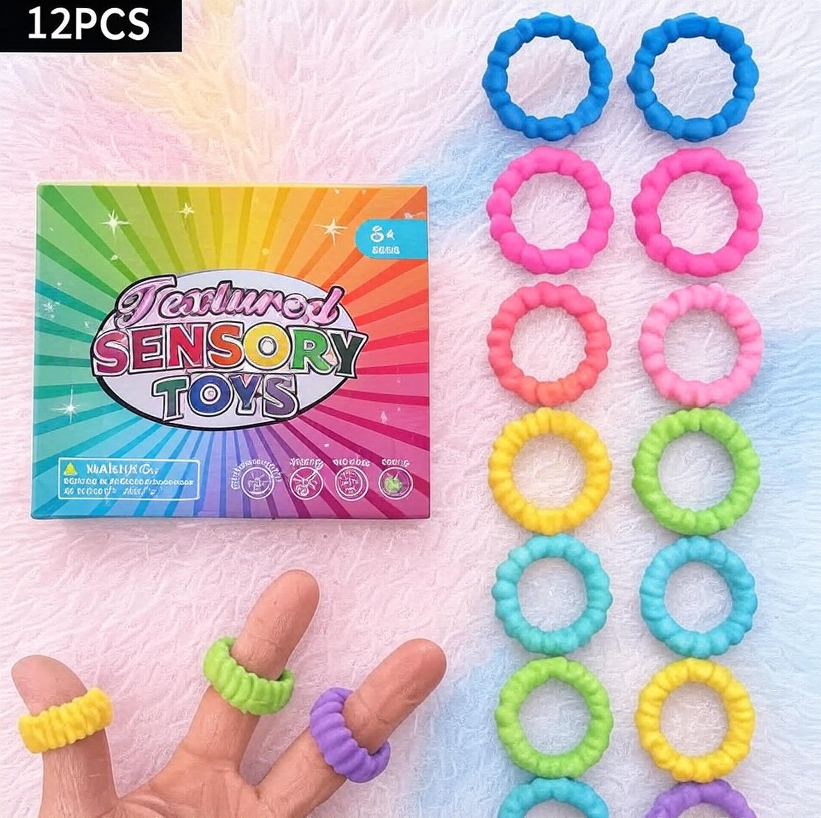 Colorful textured sensory toys with packaging on a soft surface